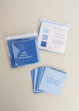 Load image into Gallery viewer, Calm Shower Affirmations cards with packaging on a beige background