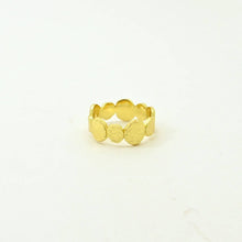 Load image into Gallery viewer, Gold ring with circular designs on a white background