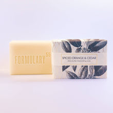 Load image into Gallery viewer, Bar of soap with packaging labeled 'Formulary 55' on a light purple background