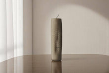 Load image into Gallery viewer, Textured candle on a reflective surface with a neutral background