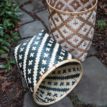 Load image into Gallery viewer, Two woven baskets with geometric patterns on a stone surface.