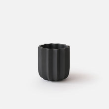 Load image into Gallery viewer, Black textured vase on a white background