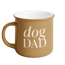 Load image into Gallery viewer, campfire mug in beige with white writing "dog dad"