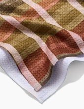 Load image into Gallery viewer, Close-up of a patterned towel with geometric design on a white background