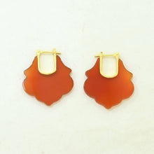 Load image into Gallery viewer, Pair of orange earrings with gold hooks on a light beige background