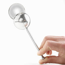Load image into Gallery viewer, Metallic ladle held by a hand against a white background