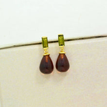 Load image into Gallery viewer, Pair of earrings with teardrop-shaped brown gemstones and green rectangular stones on a white background