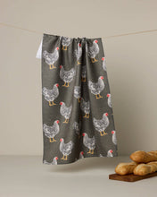 Load image into Gallery viewer, Towel with chicken pattern hanging on a line against a beige background
