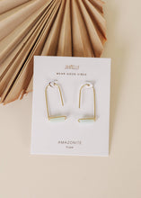 Load image into Gallery viewer, Gold hoop earrings on a Jaxfelly branded card with 'Amazonite' text against a beige background