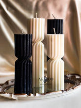 Load image into Gallery viewer, Three candles with textured design on a decorative tray, featuring the brand 'AGABOO'.
