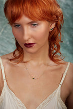 Load image into Gallery viewer, Woman with red hair wearing a delicate necklace against a blurred background
