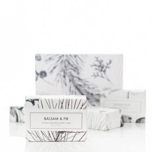 Load image into Gallery viewer, Bar of soap with 'Balsam & Fir' packaging on a marble surface
