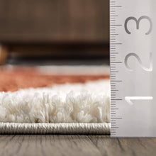 Load image into Gallery viewer, Close-up of a carpet sample with a ruler for scale on a wooden floor.