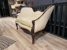 Load image into Gallery viewer, Vintage-style settee with patterned fabric on a wooden floor