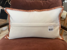 Load image into Gallery viewer, Beige pillow with brown trim on a brown cushion