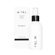 Load image into Gallery viewer, A white spray bottle labeled 'm'lky' next to its packaging box, both with the text 'Milky scented spray lotion kismet' and the volume '120ml'. The box indicates it is made in USA, Venice, CA.