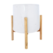Load image into Gallery viewer, White cylindrical object with wooden legs on a white background