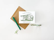 Load image into Gallery viewer, Greeting card with camper illustration and 'Happy Birthday' text, placed on a white surface with a pen and envelope.