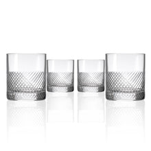 Load image into Gallery viewer, Set of four clear glass tumblers with textured design on a white background
