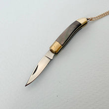 Load image into Gallery viewer, Small knife with a gold and black handle on a light gray background
