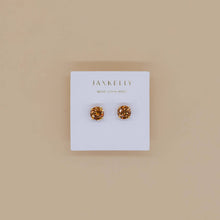 Load image into Gallery viewer, Gold earrings on a Jax Kelley branded card against a beige background