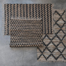 Load image into Gallery viewer, various styles of a cotton and leather rug in differnt patters, black, cream