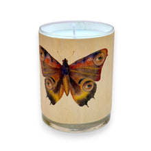 Load image into Gallery viewer, Candle in a glass container with a butterfly design on a wooden base.