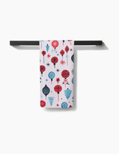 Load image into Gallery viewer, Towel with colorful abstract pattern hanging on a black rod against a white background