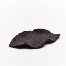 Load image into Gallery viewer, Black Incense Holder in the shape of a leaf on a white background