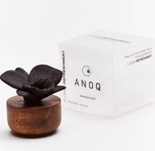 Load image into Gallery viewer, Black Orchid Flower Diffuser on an acacia wood base and branded packaging on a white background