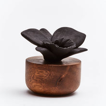 Load image into Gallery viewer, Black Orchid Flower Diffuser on an acacia wood base on a white background