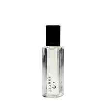 Load image into Gallery viewer, Scent Category - Spicy and Woody  Scent Notes - Cardamom | Amber | Sandalwood | Orchid | Cassis  Cruelty-free | Vegan | Non-toxic | Hypoallergenic | EU Certified  Instructions: Roll-on to pulse points or just your wrist and gently dab the product into the skin.  Your fragrance oil will come in a 8ml glass bottle with a stainless steel roll-on ball applicator.

