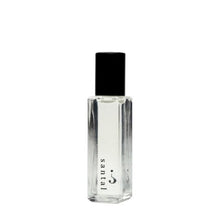Load image into Gallery viewer, Scent Category - Spicy and Woody Scent Notes - Cardamom | Amber | Sandalwood | Orchid | Cassis Cruelty-free | Vegan | Non-toxic | Hypoallergenic | EU Certified Instructions: Roll-on to pulse points or just your wrist and gently dab the product into the skin. Your fragrance oil will come in a 8ml glass bottle with a stainless steel roll-on ball applicator.