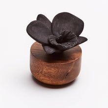 Load image into Gallery viewer, Black Orchid Flower Diffuser on an acacia wood base on a white background