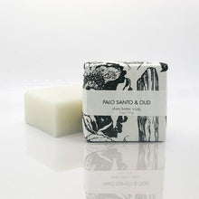 Load image into Gallery viewer, Shea butter soap bar with a black and white label on a white background
