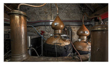 Load image into Gallery viewer, Vintage copper stills in a distillery setting
