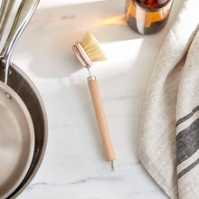 Load image into Gallery viewer, Cookware set with a frying pan, cleaning brush, and towel on a marble surface.
