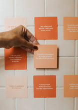 Load image into Gallery viewer, Motivational cards with affirmations on a tiled wall
