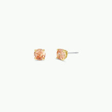 Load image into Gallery viewer, Pair of peach-colored gemstone stud earrings on a white background

