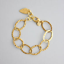 Load image into Gallery viewer, Gold chain bracelet with a leaf charm 
