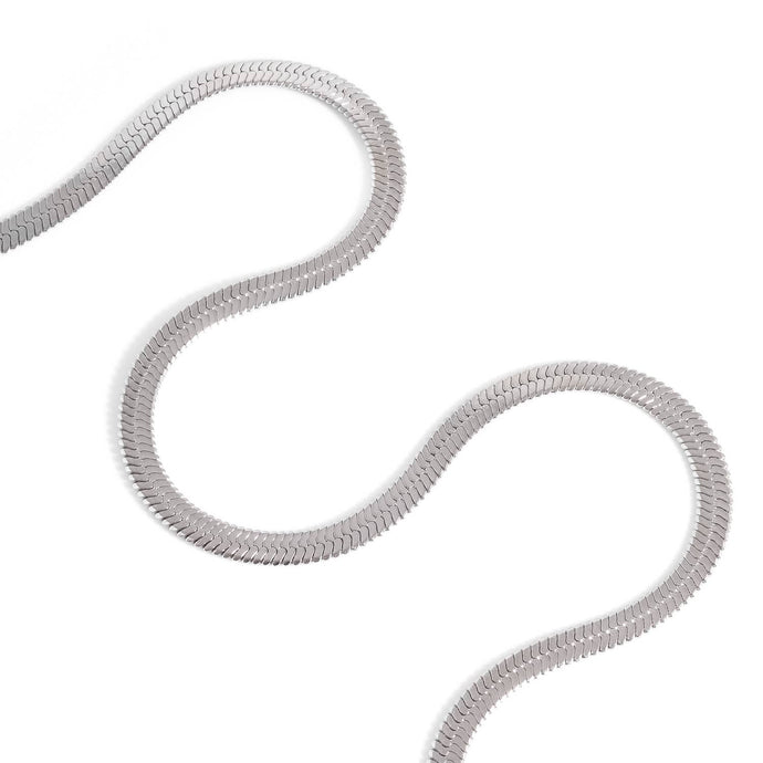 Coiled gray rope on a white background