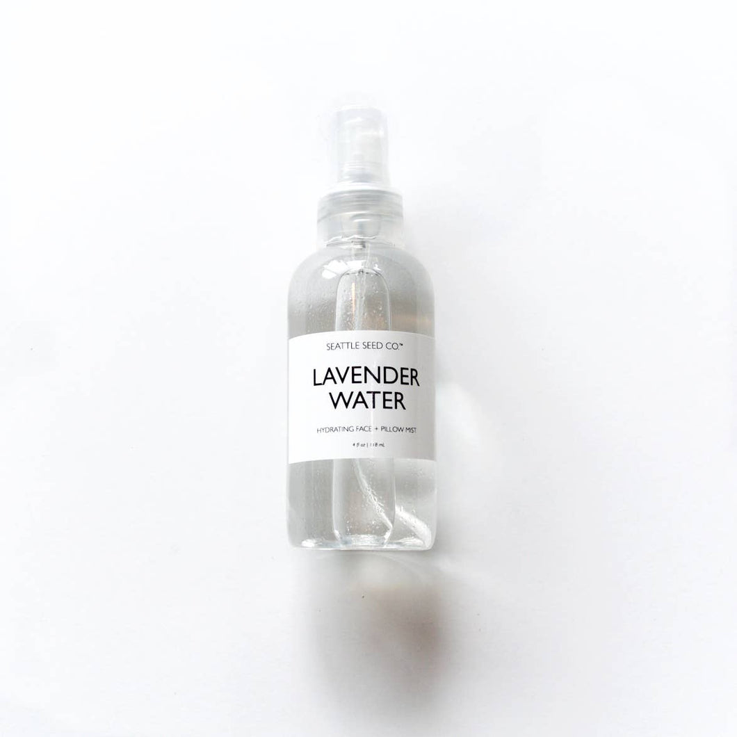 Bottle of lavendar water on a white background