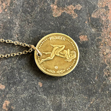 Load image into Gallery viewer, Gold coin pendant with 'Provider' engraving on a chain against a textured dark background
