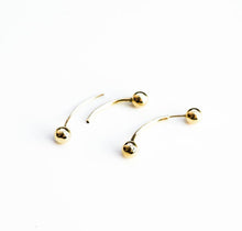 Load image into Gallery viewer, Pair of Arc ball stud Earrings in polished brass on a white background
