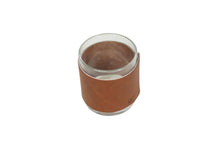 Load image into Gallery viewer, Empty glass covered by a brown leather wrap on a white background
