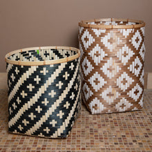 Load image into Gallery viewer, Two woven baskets with geometric patterns on a tiled floor.
