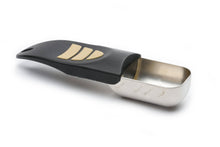 Load image into Gallery viewer, A stainless steel measuring scoop with a black handle and gold accent stripes, shown on a clean white background.
