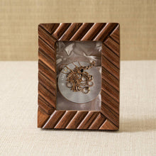 Load image into Gallery viewer, Woodenpicture frame with a decorative pattern on a beige background
