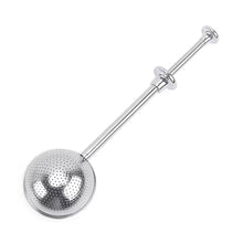 Load image into Gallery viewer, Metallic tea infuser with a long handle on a white background
