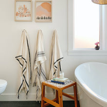 Load image into Gallery viewer, Silvia 100% Cotton Turkish Bath Towel in ivory with bold black stripe and light brown pinstripes.
